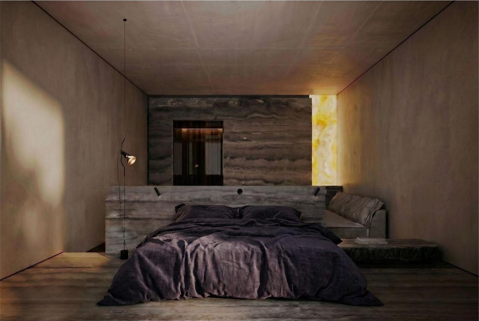 Guest room with travertine wall and bed dressed in dark linen