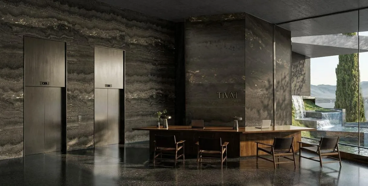 Reception desk in dark travertine.