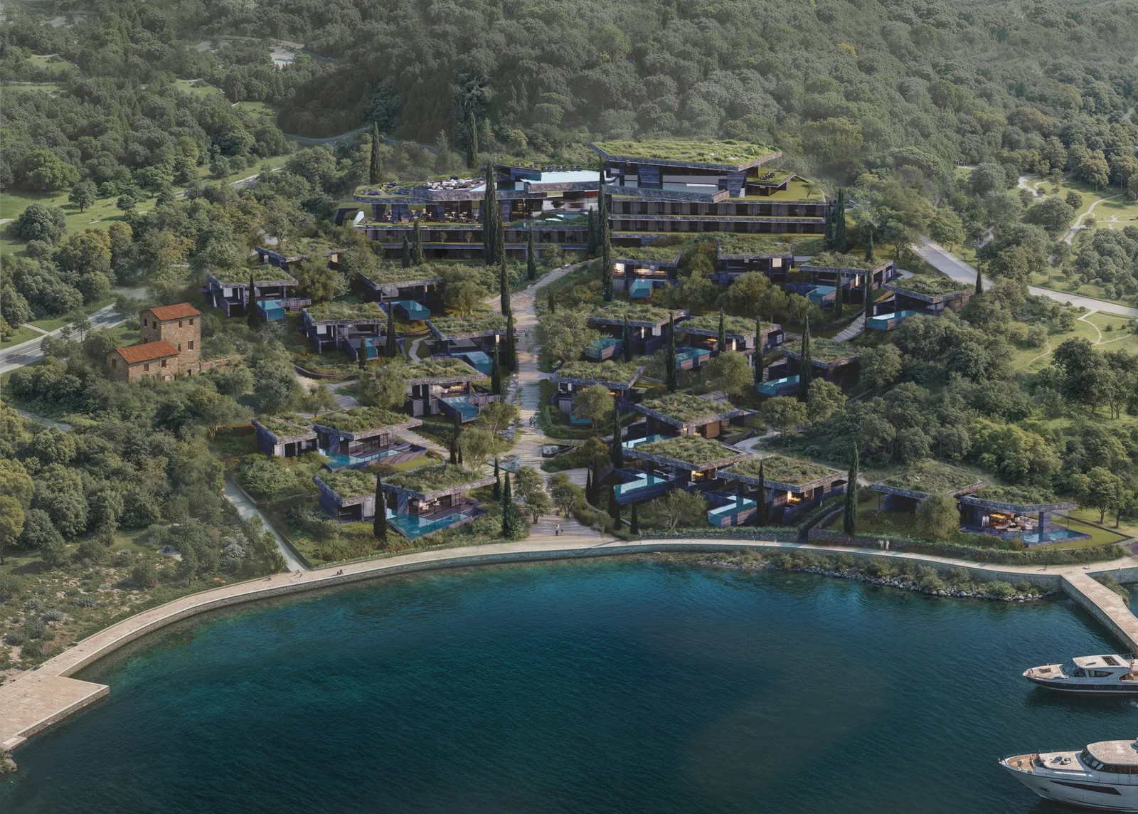 The complex from above: the hotel, twenty residences with private pools, and the shoreline.
