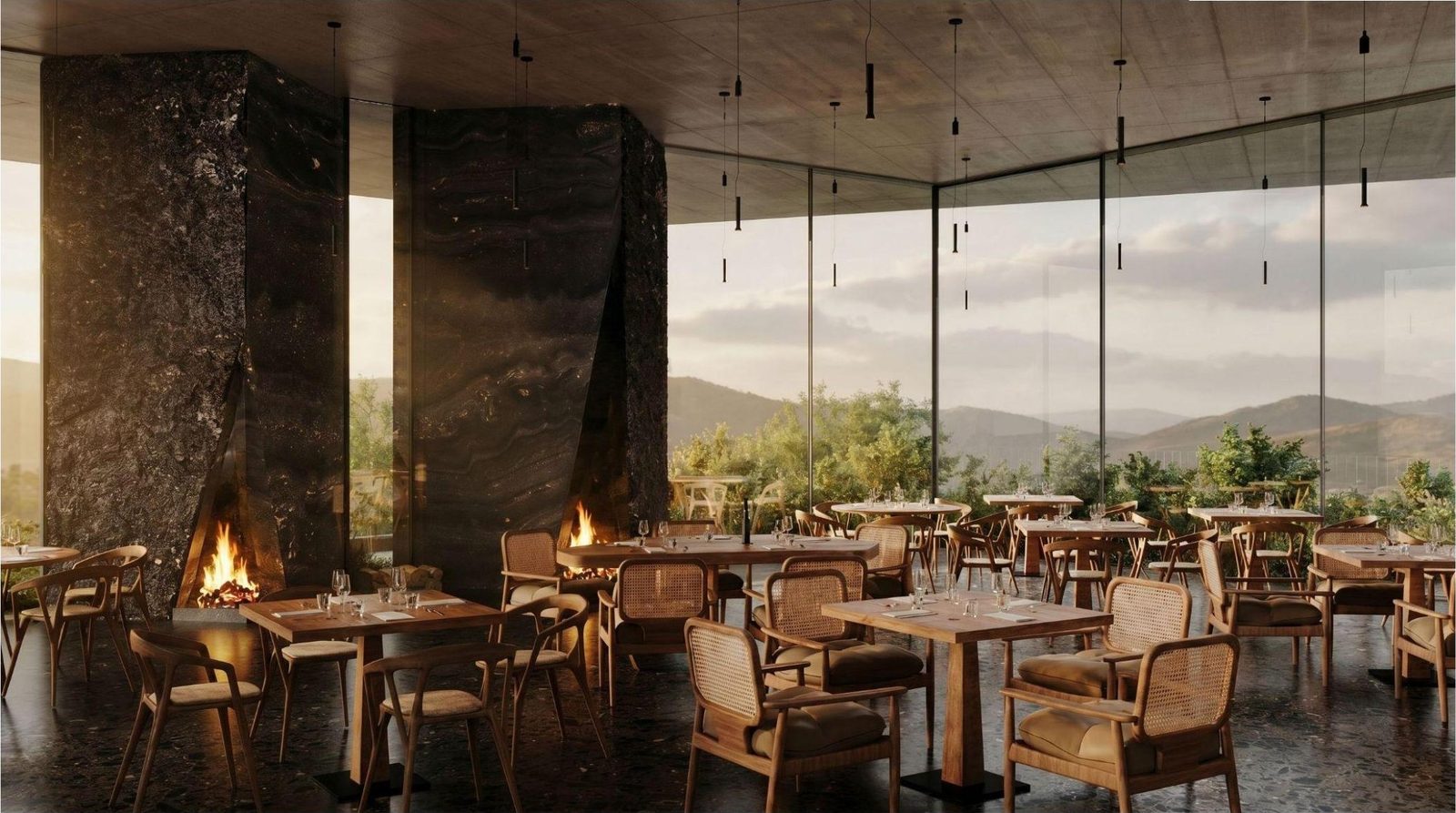 Restaurant interior with open fireplaces and stone columns