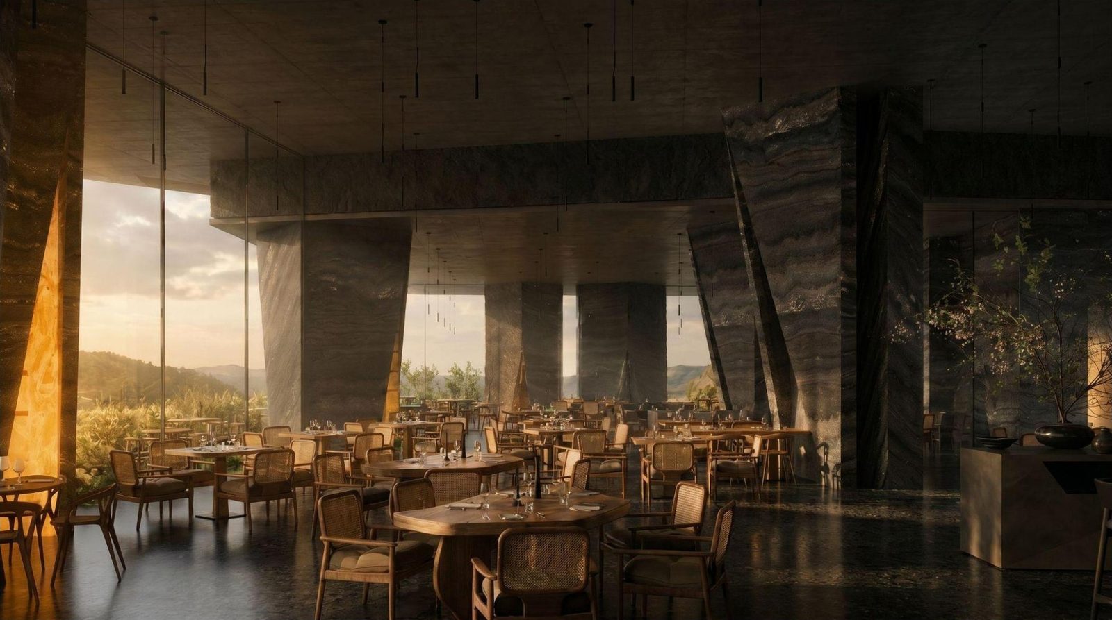 Restaurant in warm golden light with stone columns and cane furniture