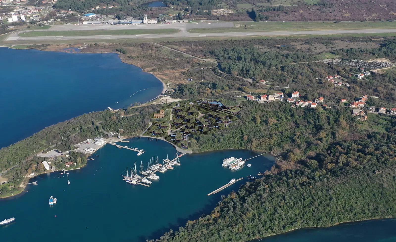 Aerial photograph of Tivat Airport and the shoreline.